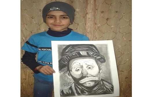 عمر رمزي: طفل فنان بالرصاص يرسم المعاناة عمر رمزي: طفل فنان بالرصاص يرسم المعاناة