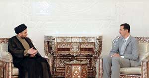 الأسد يدعو لتشكيل حكومة وحدة بالعراق   