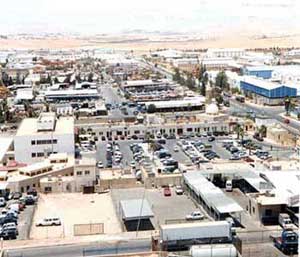 اخضاع المدن الصناعية والمناطق الحرة لاحكام قانون المناطق التنموية  