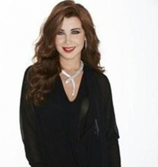 نانسي عجرم في كواليس إعلان "اراب آيدول" نانسي عجرم في كواليس إعلان "اراب آيدول"