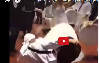 شاهد.. عروس ترقص على أنغام موسيقى الدبكة والمزمار