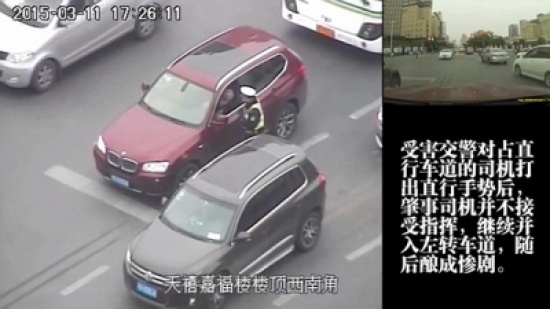 شاهد.. سحل شرطي 10 أمتار في محاولة هروب سائق بالصين