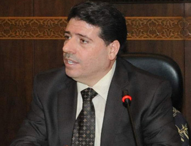 الأسد يكلف وائل الحلقي بتشكيل حكومة سورية جديدة الأسد يكلف وائل الحلقي بتشكيل حكومة سورية جديدة