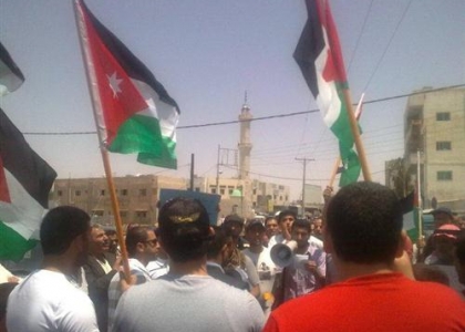 مسيرة في معان تدعو لحماية المدنيين في حلب
