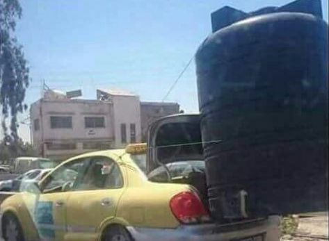 صورة ...   خزان مياه بالصندوق الخلفي لتكسي