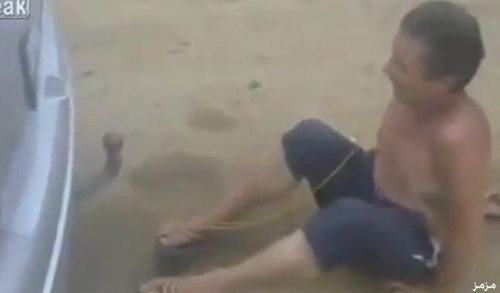 روسي يتخلص من ضرسه بواسطة سيارة