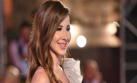 نانسي عجرم: "سيلفي وشخص ما بعرفوا خلفي" (صورة) نانسي عجرم: "سيلفي وشخص ما بعرفوا خلفي" (صورة)