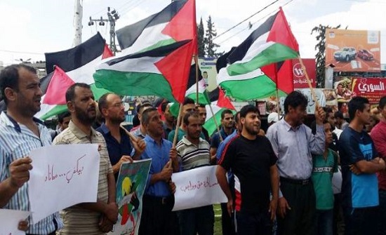 وقفة في غزة للمطالبة بحماية الطواقم الطبية ومساءلة الاحتلال الإسرائيلي وقفة في غزة للمطالبة بحماية الطواقم الطبية ومساءلة الاحتلال الإسرائيلي