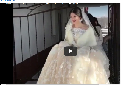 عروس تضع مصورا في موقف محرج بسبب جمالها " فيديو "