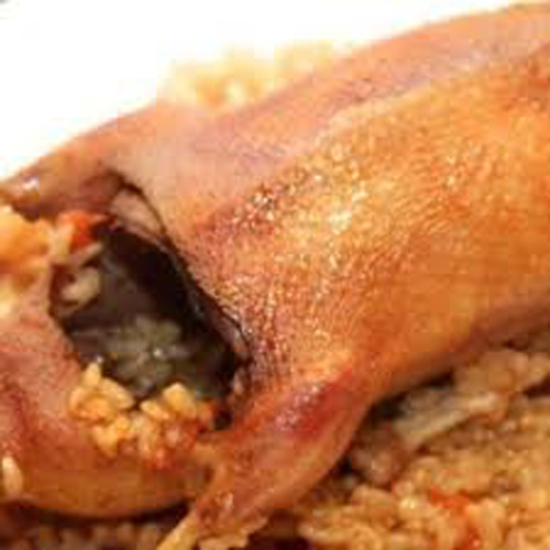 طاجن الأرز بالحمام طاجن الأرز بالحمام