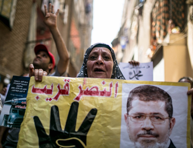 أنصار مرسي يهتفون في احتجاجات صباحية: موعدنا 3 يوليو أنصار مرسي يهتفون في احتجاجات صباحية: موعدنا 3 يوليو