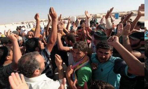 احتجاجات واسعة  في " الزعتري " بعد تأجيل ضرب سوريا