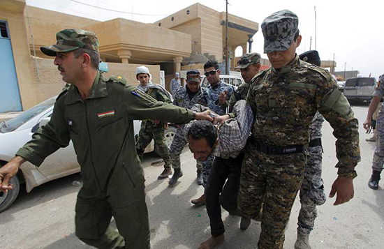 جرحى في مواجهات بين الشرطة العراقية وميليشيا «النجباء» الشيعية جرحى في مواجهات بين الشرطة العراقية وميليشيا «النجباء» الشيعية
