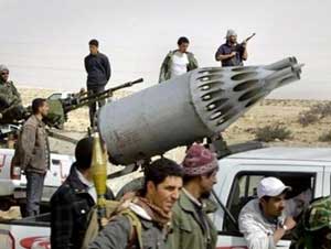 مقتل 2 وجرح 10 من الثوار في غارة لحلف الناتو والمعارضة تندد مقتل 2 وجرح 10 من الثوار في غارة لحلف الناتو والمعارضة تندد