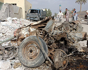 مصرع وإصابة 13 بانفجارين في بغداد 