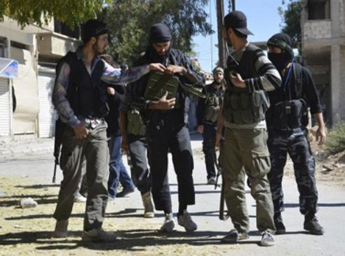 تقرير واشنطن : الاردنيون الاكثر عدداً بين المقاتلين العرب في سوريا تقرير واشنطن : الاردنيون الاكثر عدداً بين المقاتلين العرب في سوريا