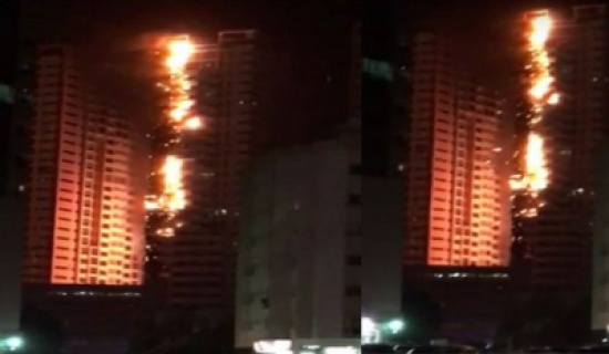 شاهد.. حريق يلتهم برجاً سكنياً ويمتد لبرج آخر