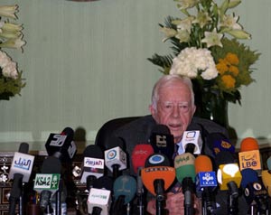 كارتر: ادعموا حكومة الوحدة الفلسطينية 