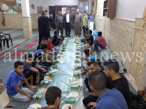 بالصور : افطار رمضاني في جرش لحفظة القرآن والايتام