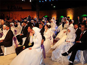 مدينة نابلس تحتضن أول عرس جماعي للمعاقين في الضفة الغربية