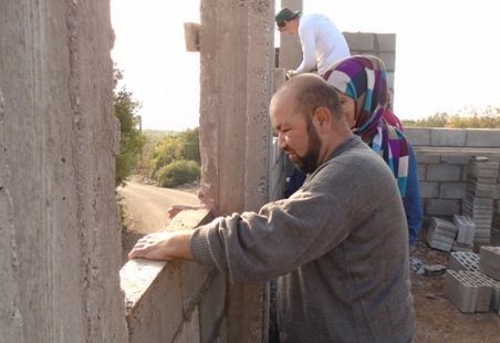 عجلون: وفد من منظمة هابيتات يطلع على مشروع صيانة مساكن الفقراء