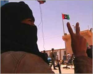 الكتائب تتوغل بتونس لتلتف على الثوار 