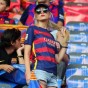 مشجعة برشلونية في مدرجات الملعب الأولمبي