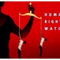 شعار " هيومن رايتس ووتش " وصورة تعبيرية عن التعذيب