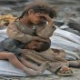 أرشيفية - أطفال يعانون بسبب الفقر