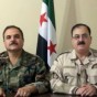 وزير الدفاع في الحكومة السورية المؤقتة سليم إدريس الى اليمين