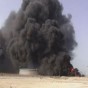 الدخان المتصاعد من ميناء الزيت النفطي في محافظة عدن