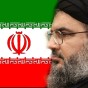 الأمين العام لحزب اللح حسن نصر الله وفي الخلفية علم ايران
