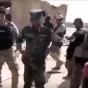 صورة للميليشيات الشيعية وهي تقوم باعدام الشبان السنة في الكرمة - من الفيديو