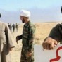 معممون شيعة يصحبون القوات العسكرية في معارك الموصل لتحريضهم على القتال