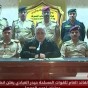 العبادي خلال إلقائه بيان معركة لموصل وحوله ضباط