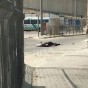 صورة للشهداء الفلسطينيين وهما ملقيان على الارض بعد اصابتهما برصاص الاحتلال