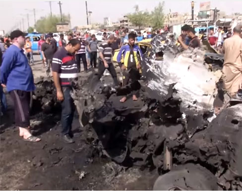 مقتل وجرح أكثر من 200 شخص في سلسلة تفجيرات شهدتها بغداد (فيديو)