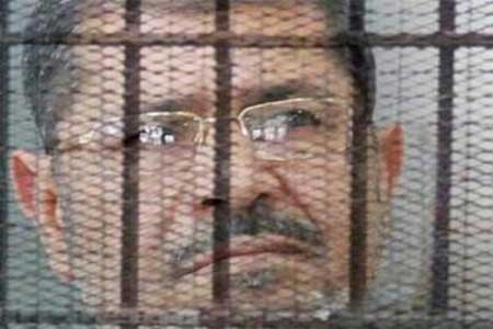 مرسي من داخل قفص " اقتحام السجون " : سيفشلون والانقلاب إلى زوال مرسي من داخل قفص " اقتحام السجون " : سيفشلون والانقلاب إلى زوال