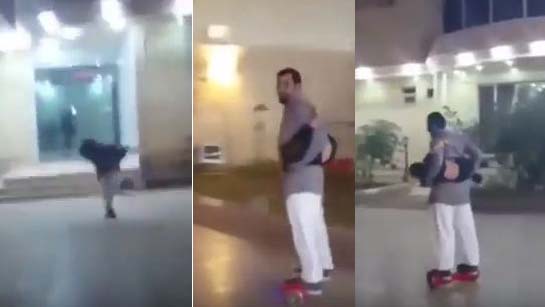 شاهد..  سقوط رجل يلعب بـ سكوتر ذكي وطفله على ظهره