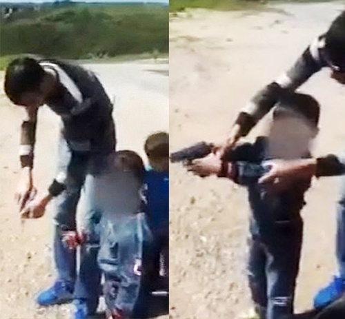 شاهد.. تركي يعلّم طفله على إطلاق النار من المسدس
