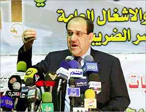 المالكي يقاضي علاوي 		