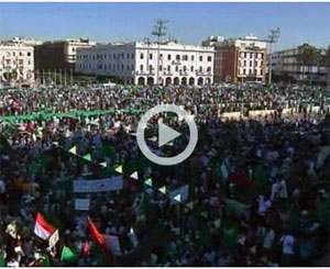 القذافي يتعهد بهزيمة الناتو  