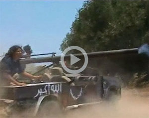 الناتو يقر بقصف الثوار 