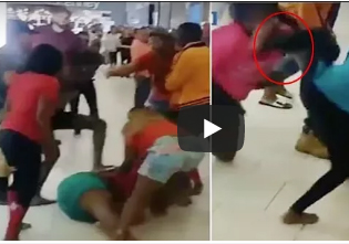 أم تدفع عربة طفل تركل وتلكم سيدة بوحشية (فيديو)