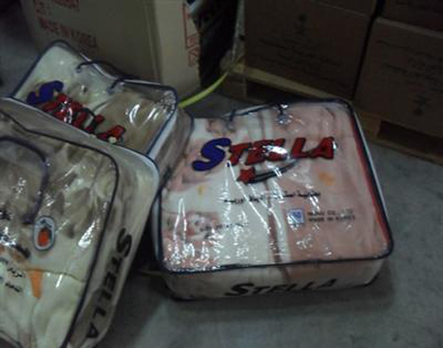 الحمراء لذوي الاحتياجات الخاصة توزع حرامات على لاجئين سوريين