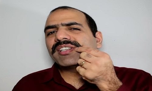 شاهد.. رجل يحلق "شاربه" صعقا بالكهرباء