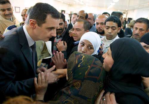 الأسد يقوم بزيارة مفاجئة إلى مركز تربوي للفنون في دمشق الأسد يقوم بزيارة مفاجئة إلى مركز تربوي للفنون في دمشق
