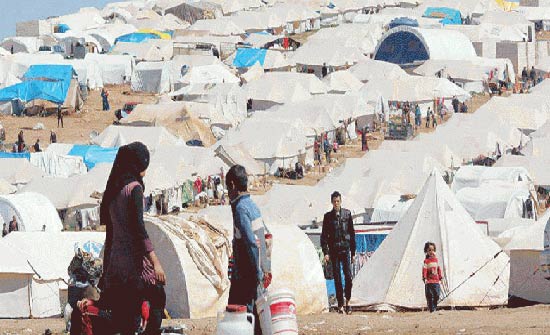 عودة 800 لاجىء سوري من الاردن