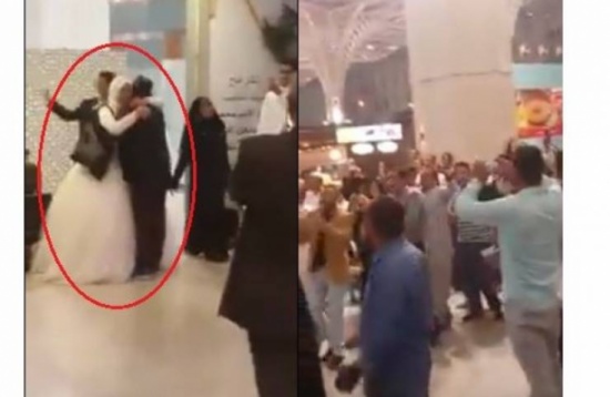 فيديو| هذا ما حدثَ لعريس مصريّ حَمَلَ عروسه ورقص بها في مطار المدينة المنورة! فيديو| هذا ما حدثَ لعريس مصريّ حَمَلَ عروسه ورقص بها في مطار المدينة المنورة!