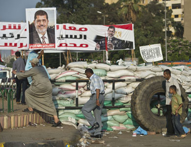 إصابة العشرات من أنصار مرسي ومعارضيه في مدينة دمياط الساحلية إصابة العشرات من أنصار مرسي ومعارضيه في مدينة دمياط الساحلية